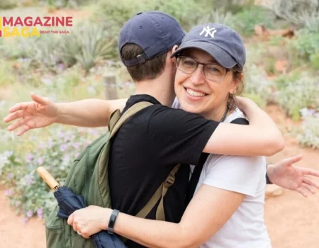 Miles Roosevelt Bialik Stone hugging his mother, actress Mayim Bialik, outdoors