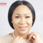 Sandra Onyenucheya, Nigerian entrepreneur and CEO of Vivabella Designs, smiling in a beige top with pearl jewelry