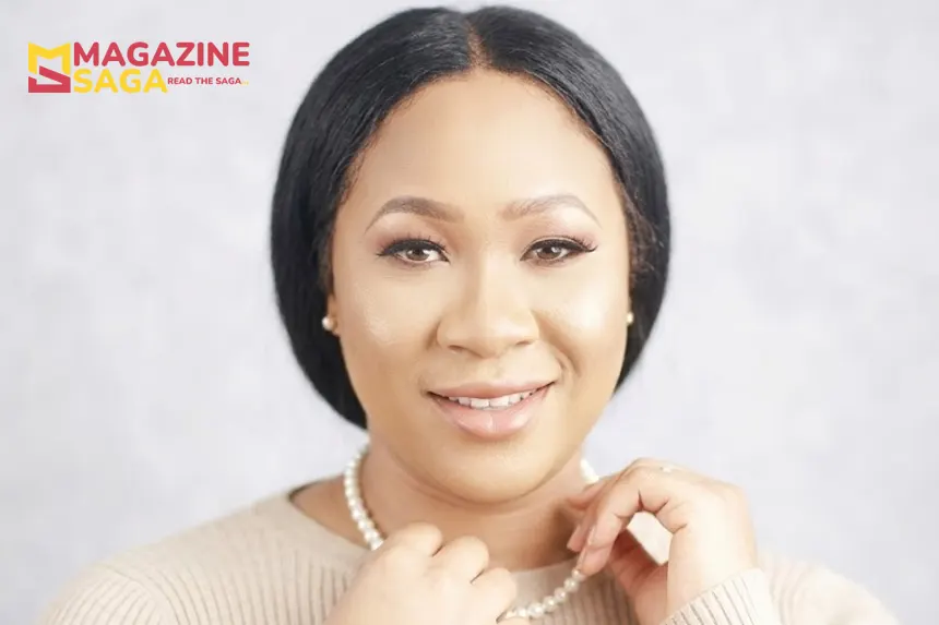 Sandra Onyenucheya, Nigerian entrepreneur and CEO of Vivabella Designs, smiling in a beige top with pearl jewelry