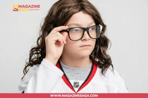 A young child wearing an NHL hockey jersey and glasses, adjusting their frames in a casual photo.