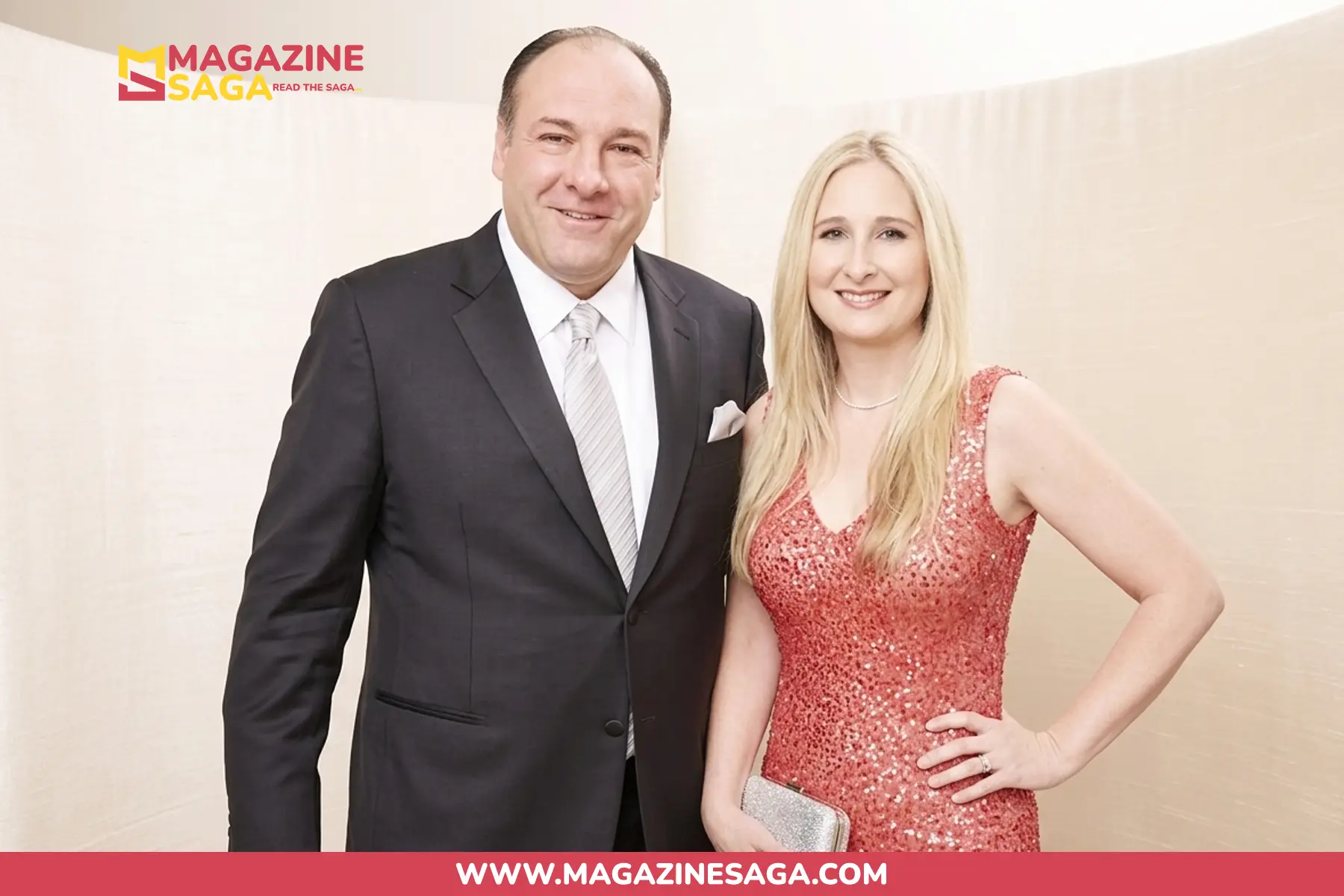 couple in formal attire, man in black suit, woman in pink sequin dress, red carpet style photo