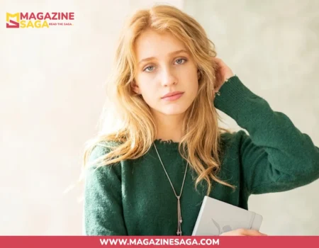 Young woman in a green sweater holding a notebook, used as a representative image for Jessie Phoenix Jopling biography