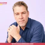 Portrait of a man in a blue button-down shirt, used for the Kevin Knasel biography article.