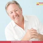 Mark Fluent, real estate finance executive and husband of actress Justine Bateman, smiling in a white shirt