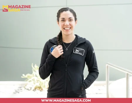 Gillis wearing a SpaceX uniform jacket, smiling ahead of the Polaris Dawn mission in 2024