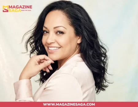 Sonya Nicole Hamlin smiling in a light pink blazer, featured in her biography on Magazine Saga