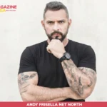 Andy Frisella net worth photo, bearded man in black shirt with tattooed forearms crossed
