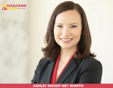 Ashley Moody net worth headshot, senator smiling in black blazer with red top