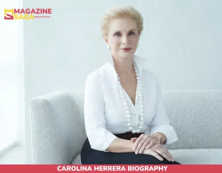 Carolina Herrera biography portrait, seated in white blouse and pearl necklace