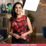 Maneet Chauhan smiling in floral dress during studio portrait session