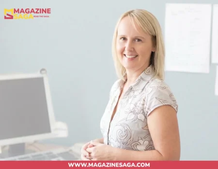 Blonde woman in office smiling, Suzanne Whiston net worth article