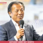 Anthony Hsieh speaking into a microphone for the net worth article