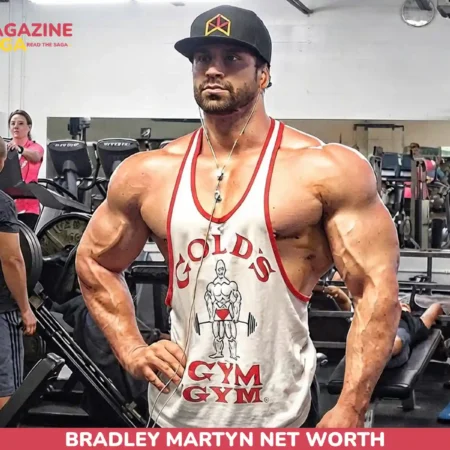 Bradley Martyn net worth wearing a Gold's Gym tank top on a gym floor for the Bradley Martyn article