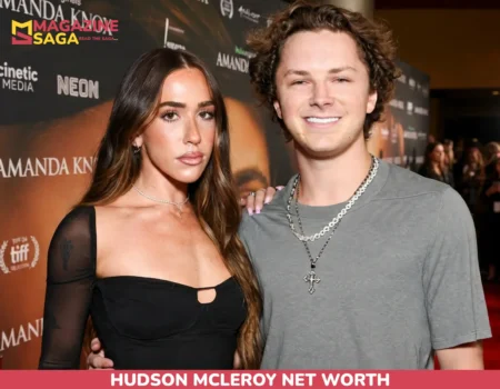 Hudson McLeroy net worth in grey t-shirt with layered necklaces, red carpet photo for article