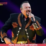 Pepe Aguilar singing on stage in an embroidered charro jacket for the pepe aguilar net worth article