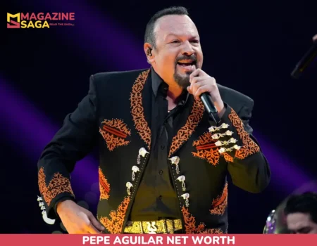 Pepe Aguilar singing on stage in an embroidered charro jacket for the pepe aguilar net worth article
