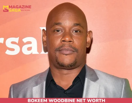 Bokeem Woodbine Net Worth article portrait in silver blazer at press backdrop
