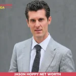 Jason Hoppy in a navy North Face puffer jacket outdoors, pictured for his net worth article.