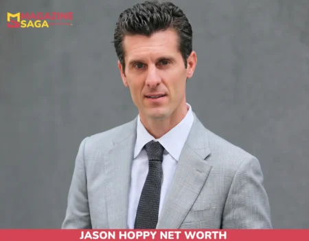 Jason Hoppy in a navy North Face puffer jacket outdoors, pictured for his net worth article.