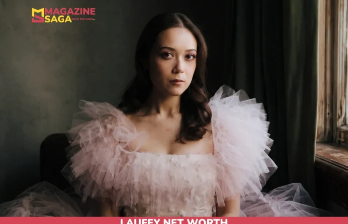 Laufey Net Worth 2026 – Two Grammy Wins, No Confirmed Figure Laufey seated by a window in a pink ruffled tulle gown, portrait for the Laufey net worth article