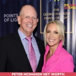 Peter McMahon net worth article photo: two people smiling in front of a navy event backdrop